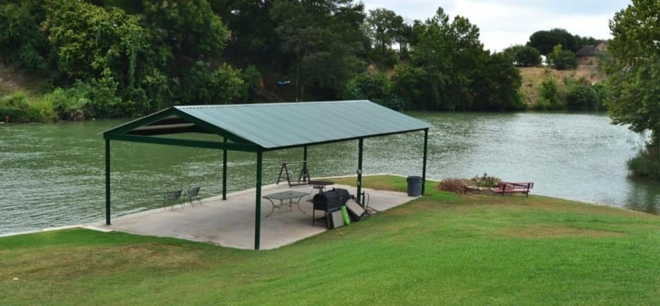 Golf-course getaway with fairway views, pool, WiFi, & central AC House in Seguin