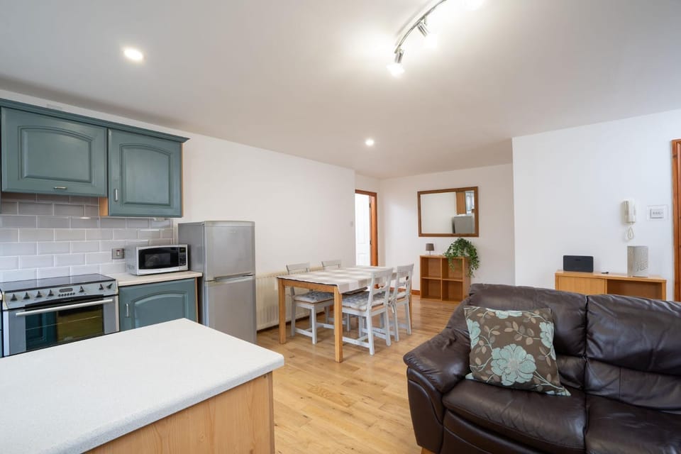 Living room, microwave, oven, kitchen