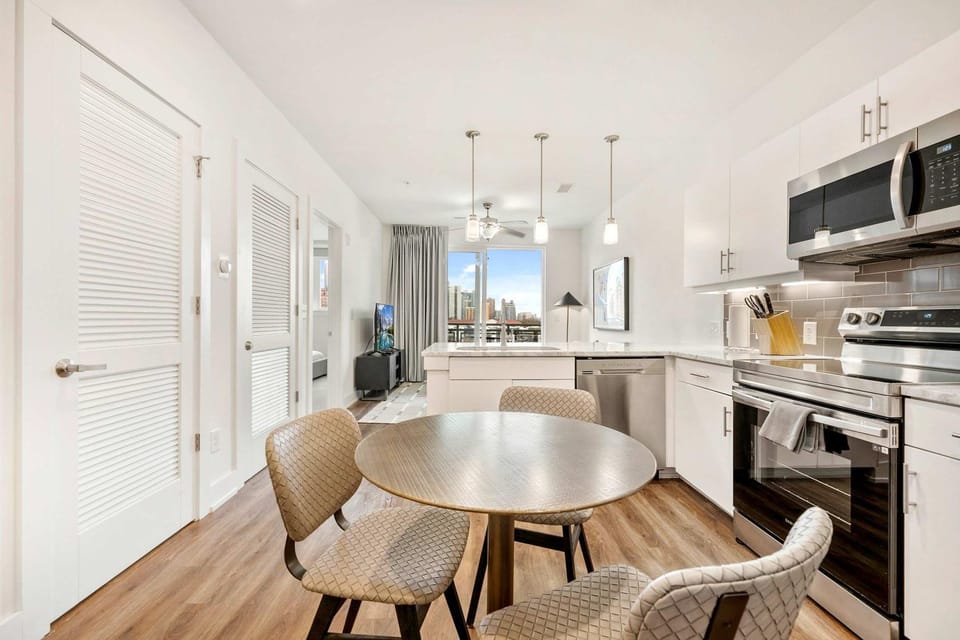 Kitchen or kitchenette, Living room, Dining area, dishwasher, oven, stove, toaster