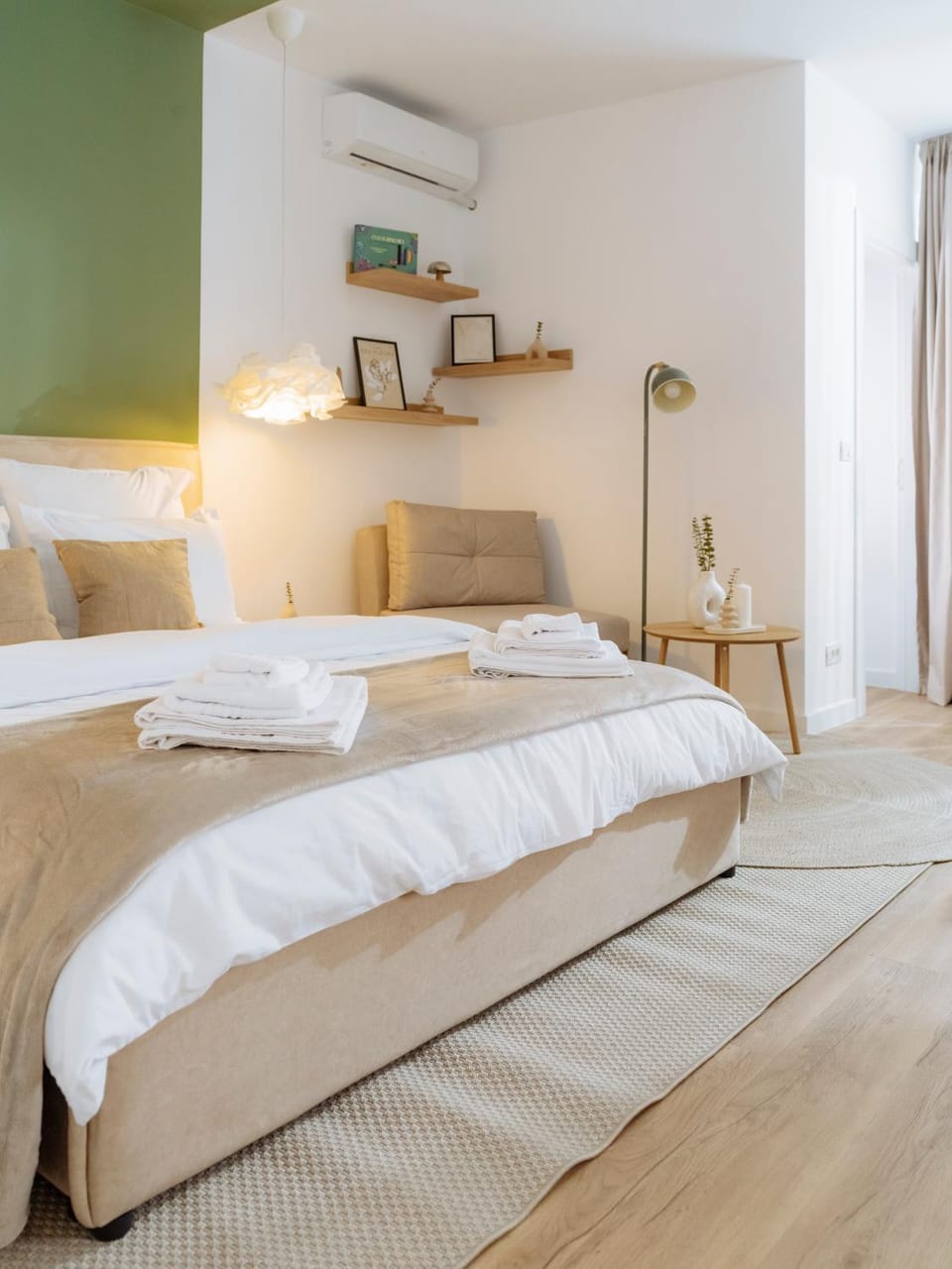 Bed, Living room, Seating area, Bedroom, towels, air conditioner
