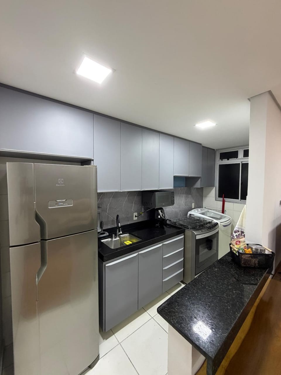 Kitchen or kitchenette, stove, laundry