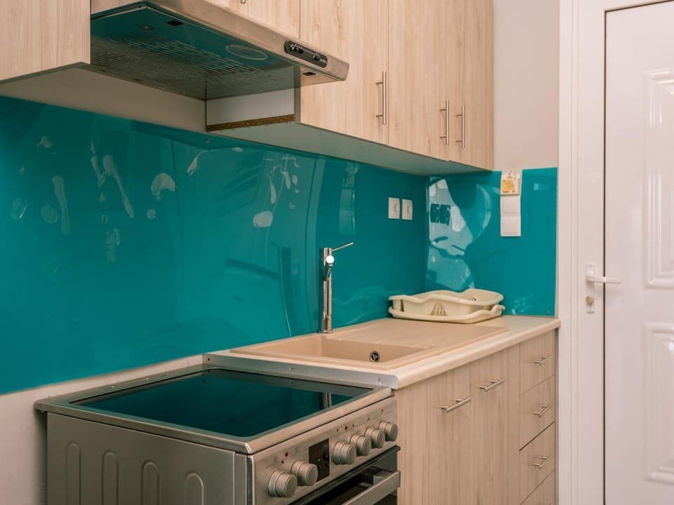 Kitchen or kitchenette, stove