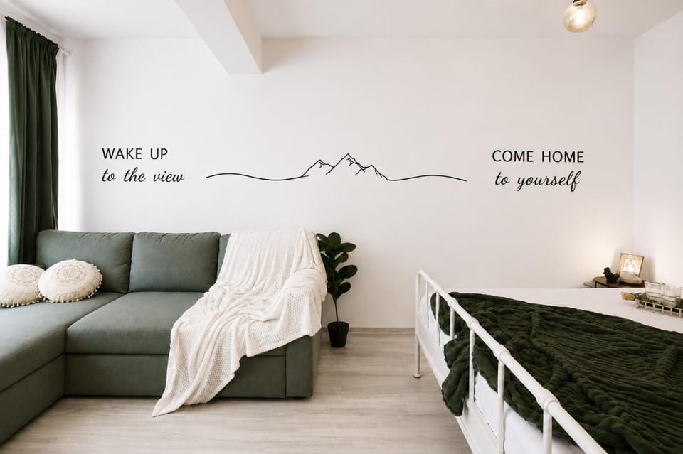 Bed, Living room, Seating area, Text overlay