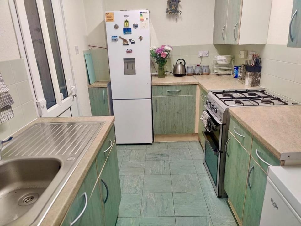 Kitchen or kitchenette, oven, stove, toaster