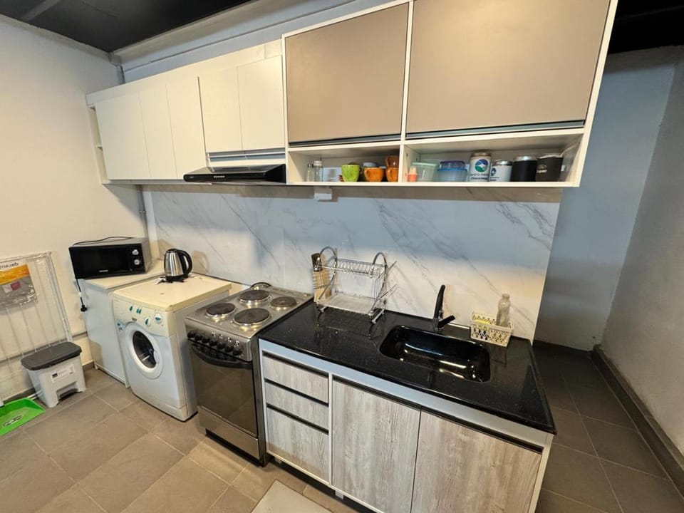 Kitchen or kitchenette, oven, stove