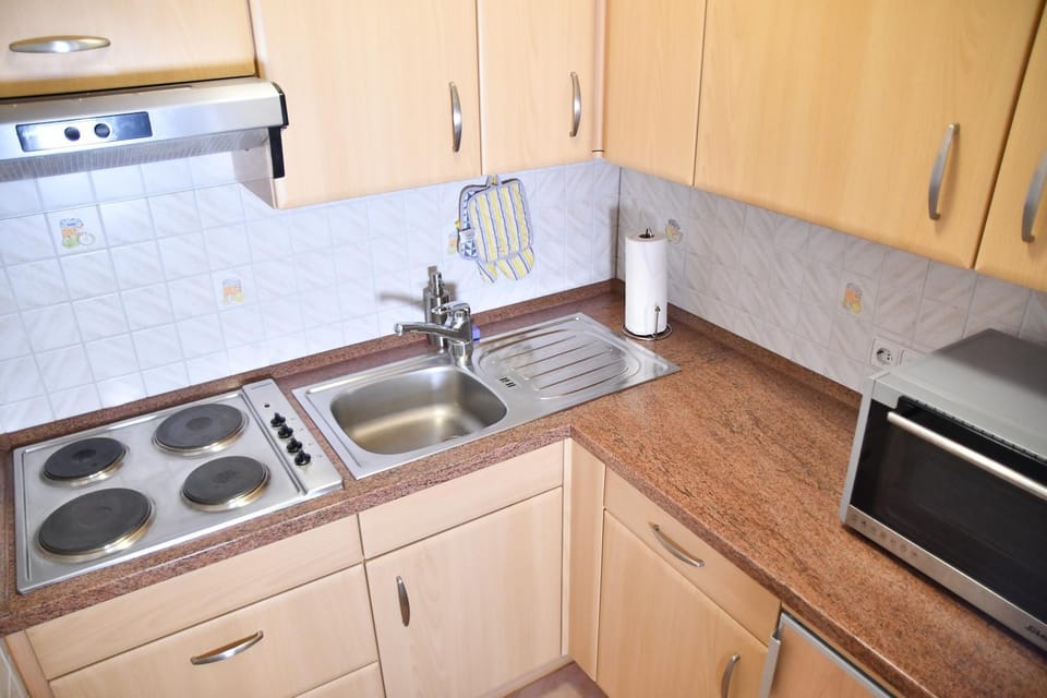 Kitchen or kitchenette, microwave