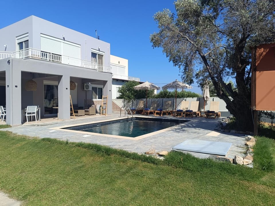 Property building, Pool view, sunbed