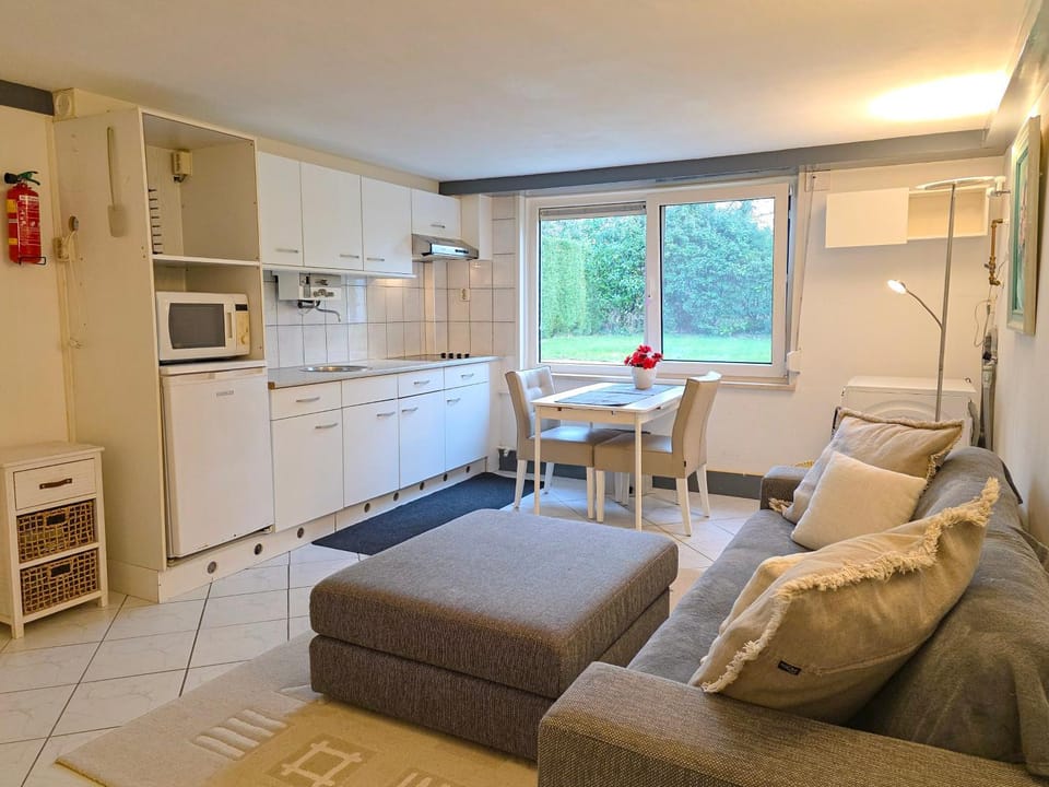 Seating area, microwave, toaster, kitchen