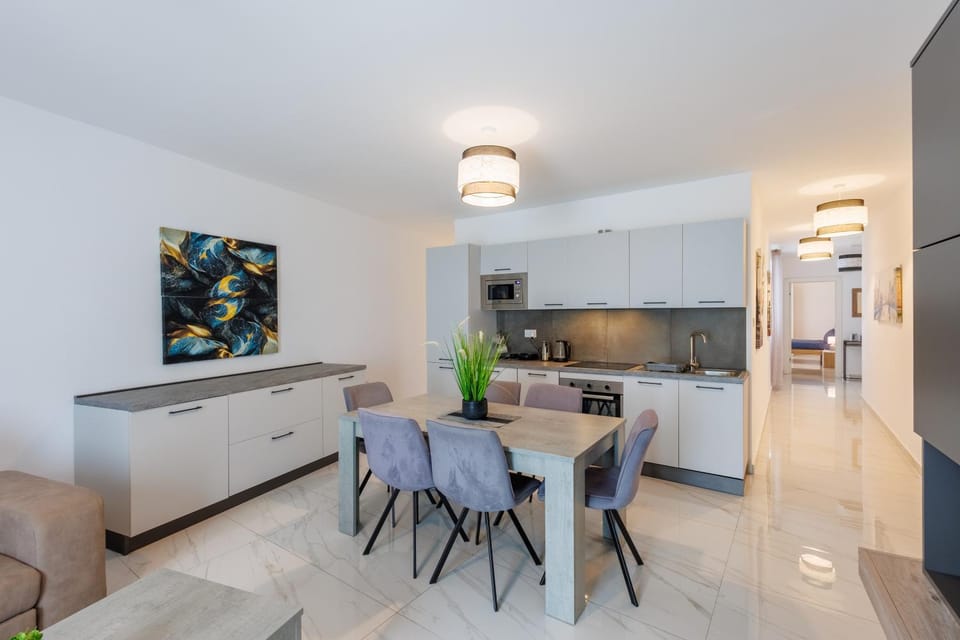 Kitchen or kitchenette, Living room, Seating area, Dining area, dishwasher, oven, stove