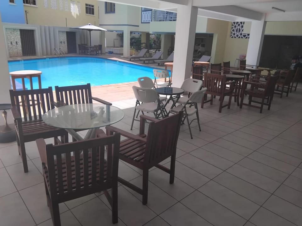 Swimming pool, sunbed