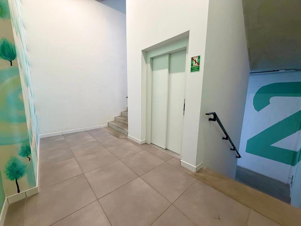 Property building, elevator