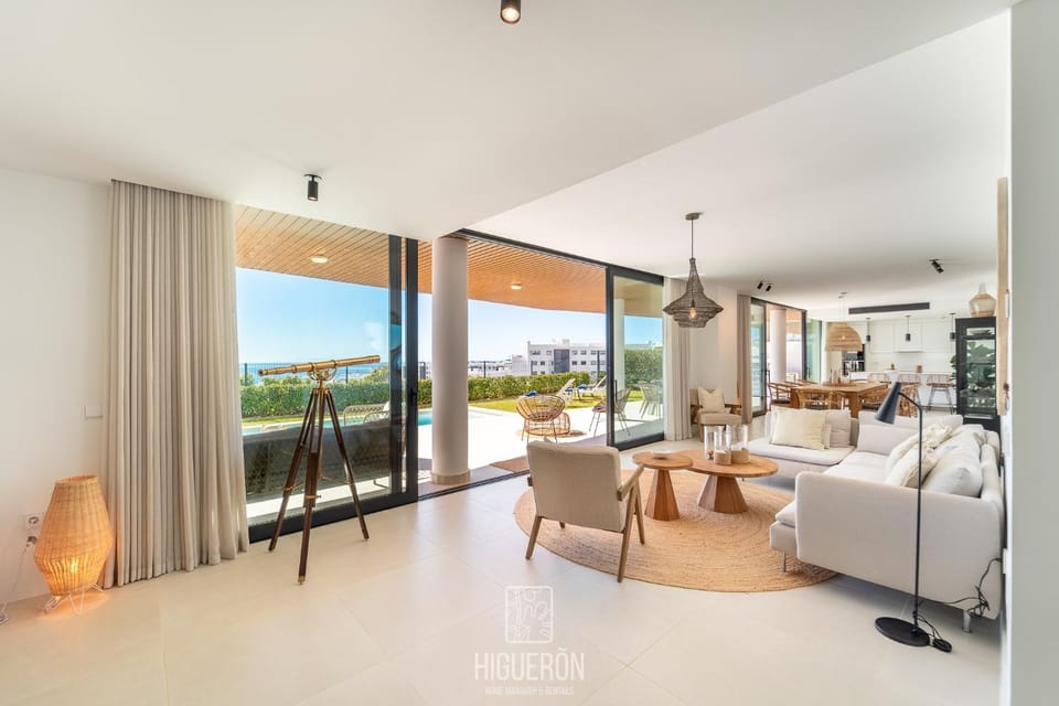 View (from property/room), Living room, Seating area, Sea view
