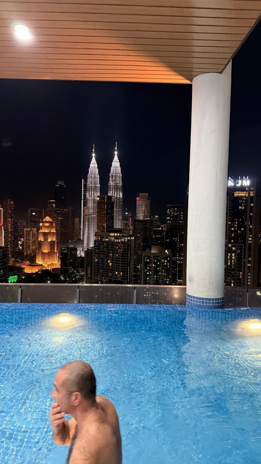 Property building, Nearby landmark, Night, People, Natural landscape, City view, Pool view, Swimming pool, group of guests