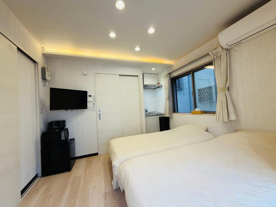 Bed, TV and multimedia, Kitchen or kitchenette, air conditioner