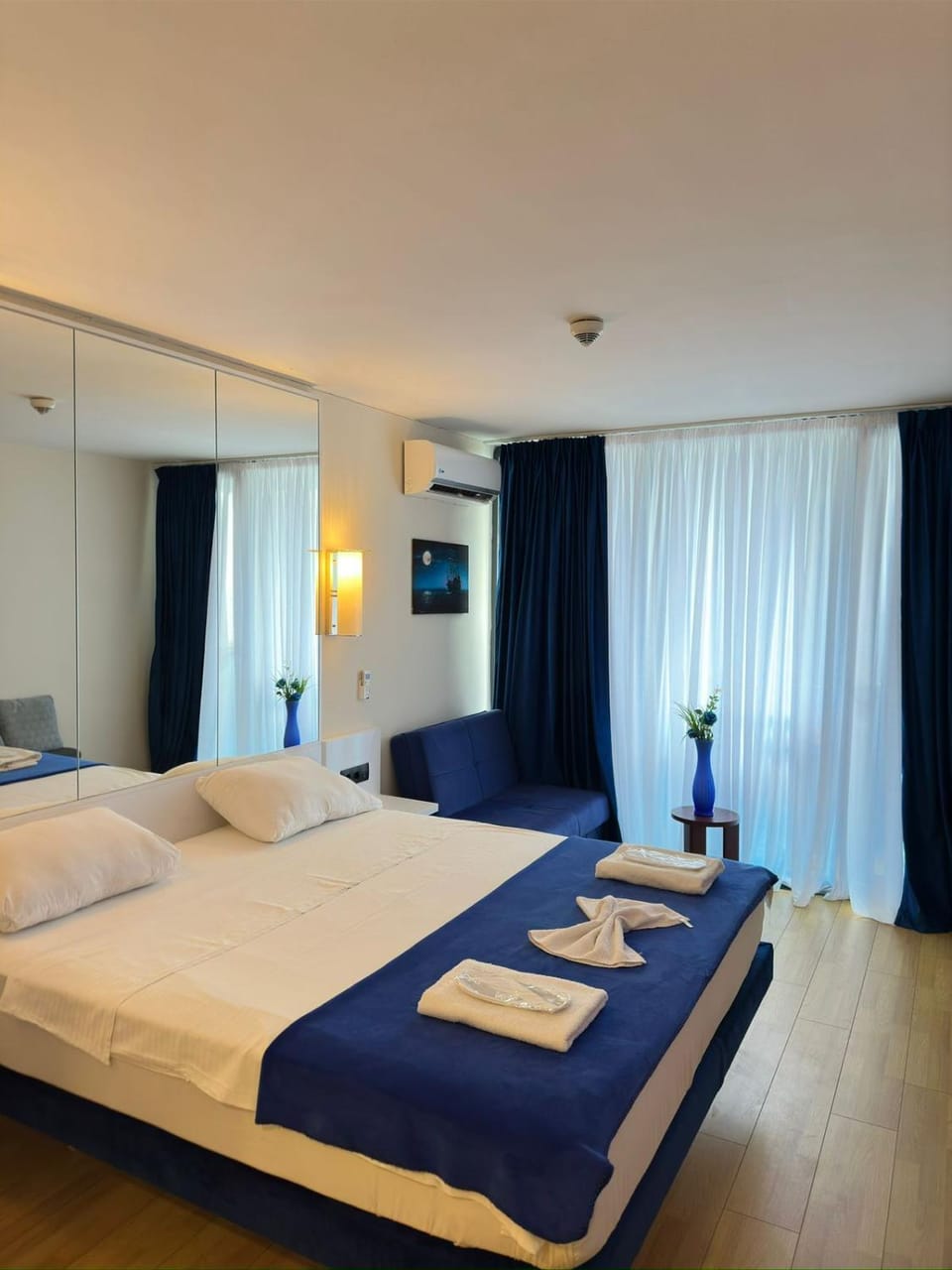 Bed, Bedroom, towels, air conditioner