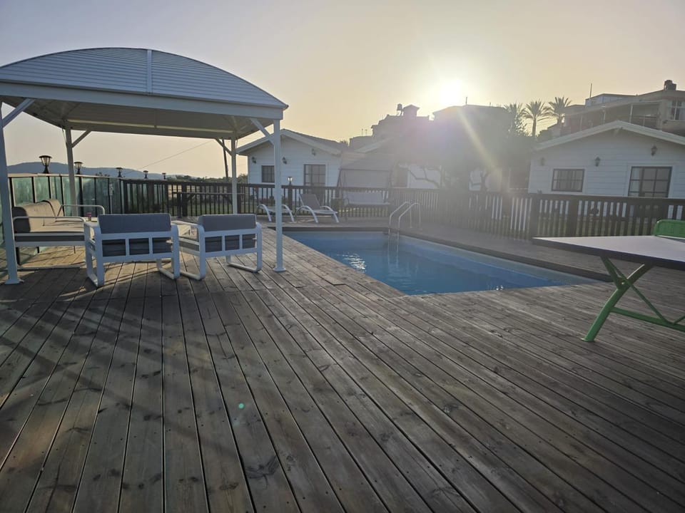 Patio, Pool view, sunbed