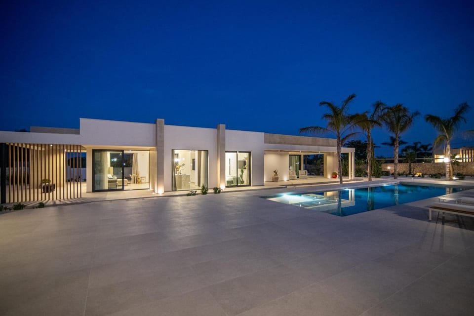 Property building, Night, Pool view, Swimming pool, sunbed