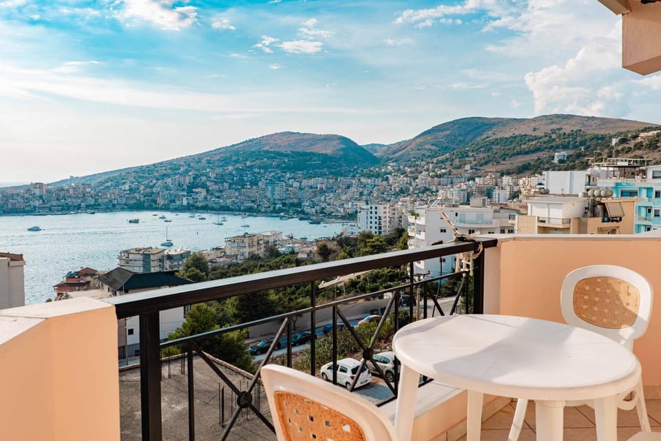 Property building, Day, View (from property/room), Seating area, Dining area, City view, Lake view, Sea view