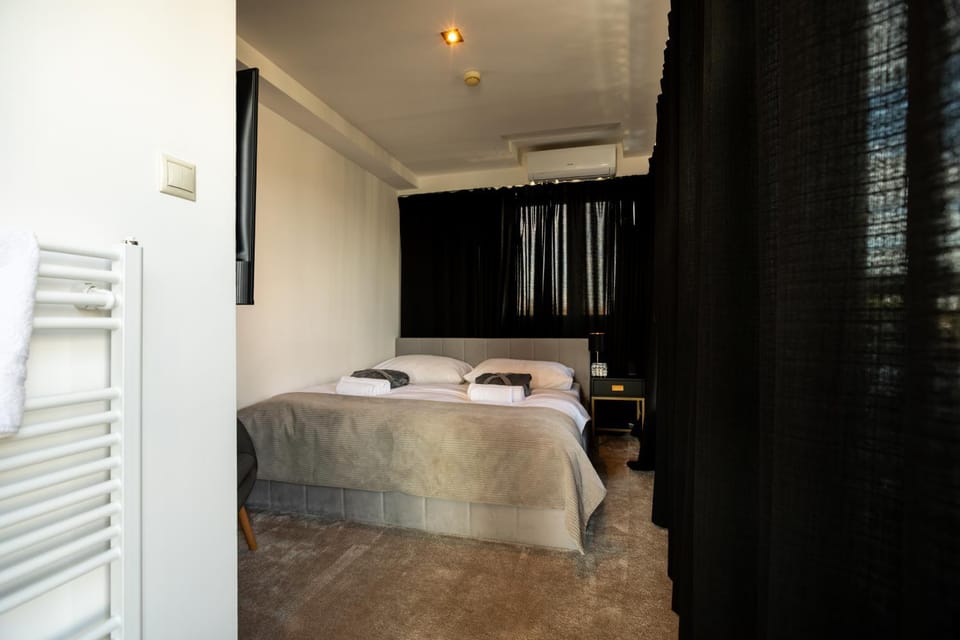 Bed, Photo of the whole room, Bedroom, towels, air conditioner