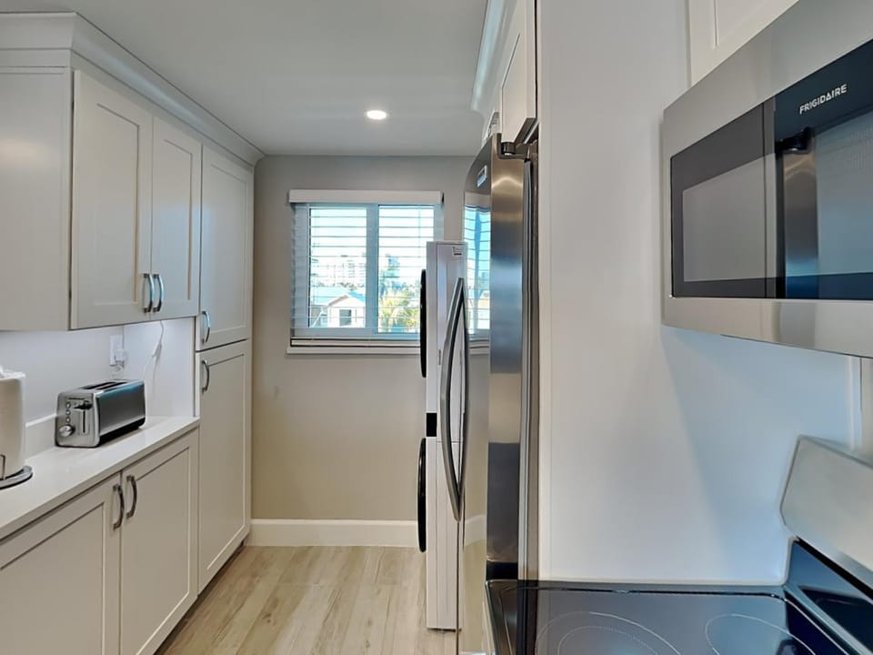 Kitchen or kitchenette, Street view, furniture, microwave, toaster