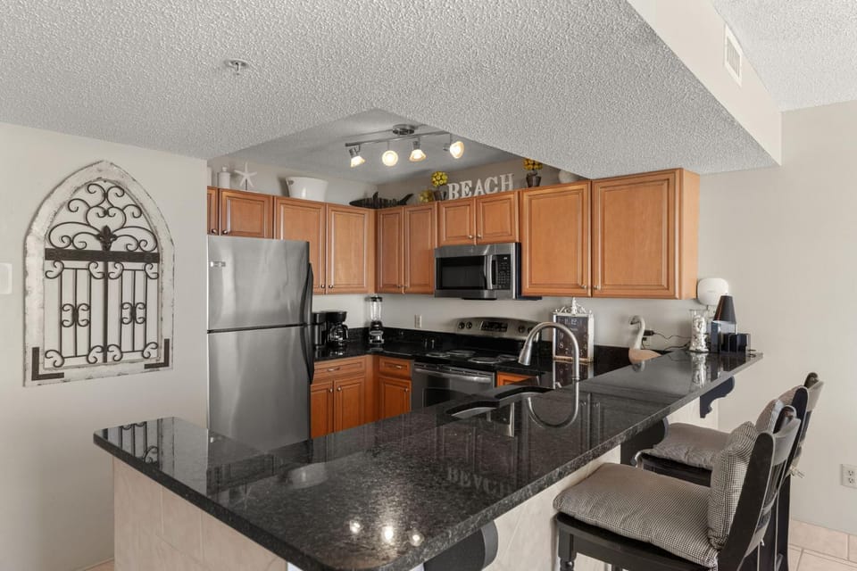 Kitchen or kitchenette, Seating area, furniture, microwave, oven