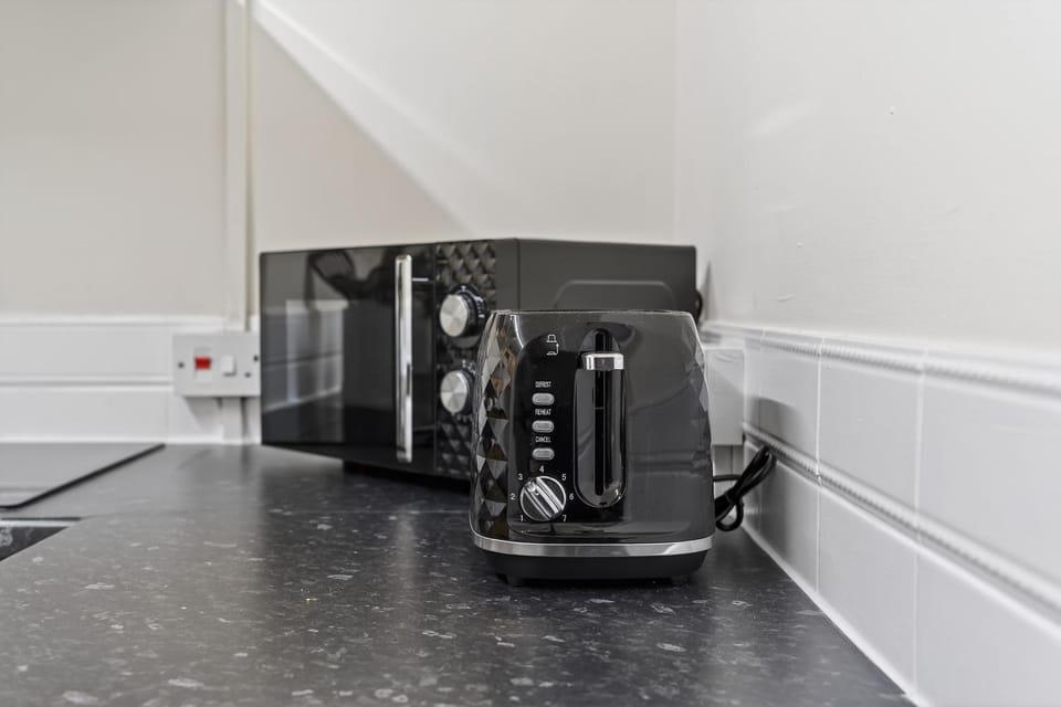 Kitchen or kitchenette, toaster