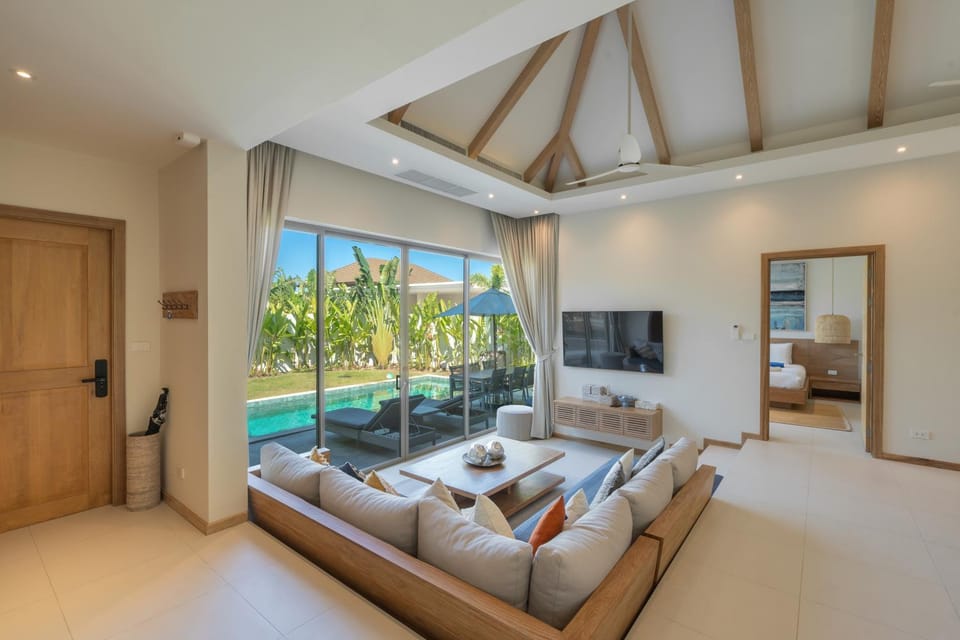 TV and multimedia, Living room, Seating area, Pool view, Swimming pool
