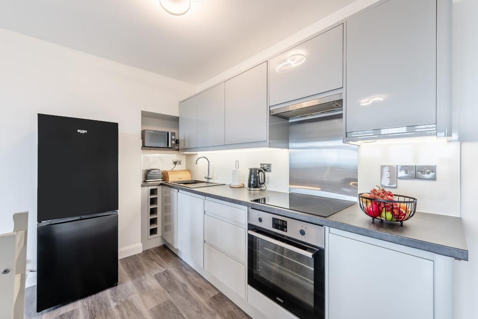 Kitchen or kitchenette, stove, toaster
