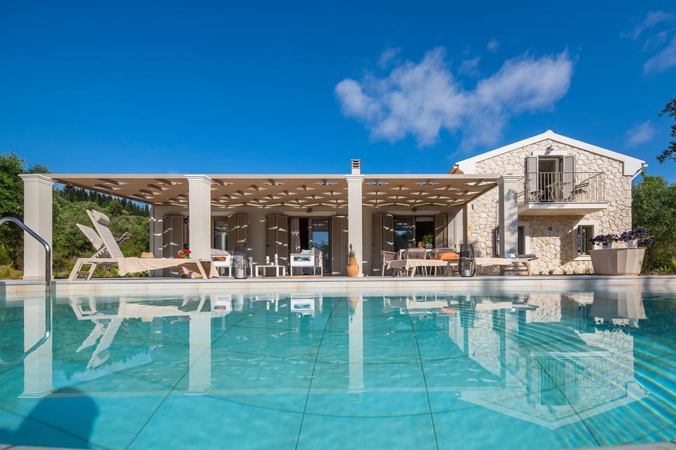 Property building, Patio, Pool view, Swimming pool, sunbed