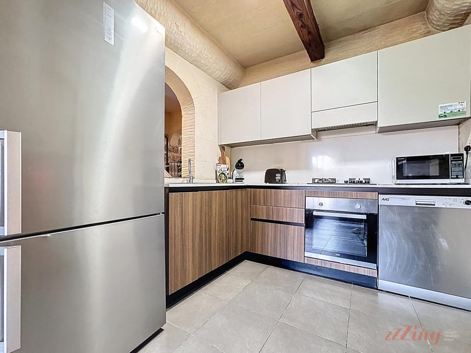 Kitchen or kitchenette, dishwasher, microwave, oven, stove, toaster