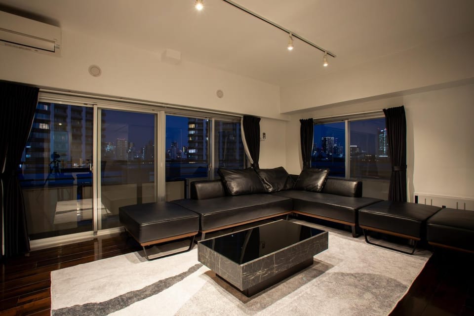 TV and multimedia, Living room, Seating area, City view, air conditioner