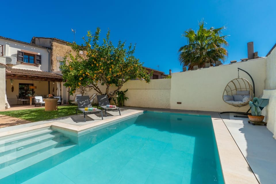Property building, Living room, Swimming pool