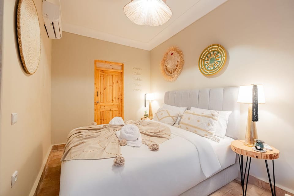 Bed, Photo of the whole room, Bedroom, towels, air conditioner