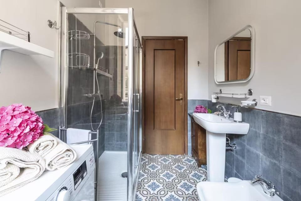 Shower, Toilet, Bathroom, bidet, towels, washing machine