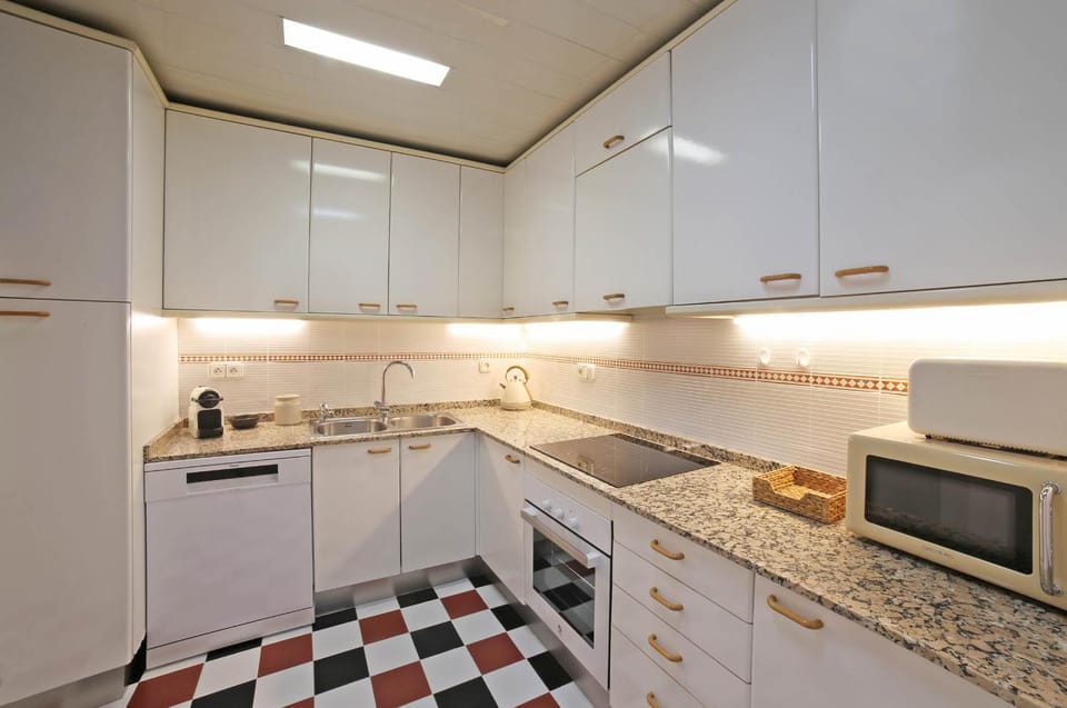 Kitchen or kitchenette, dishwasher, oven, stove, toaster