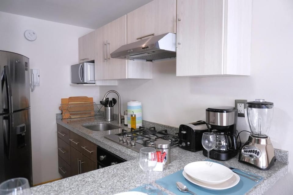 Kitchen or kitchenette, oven, toaster