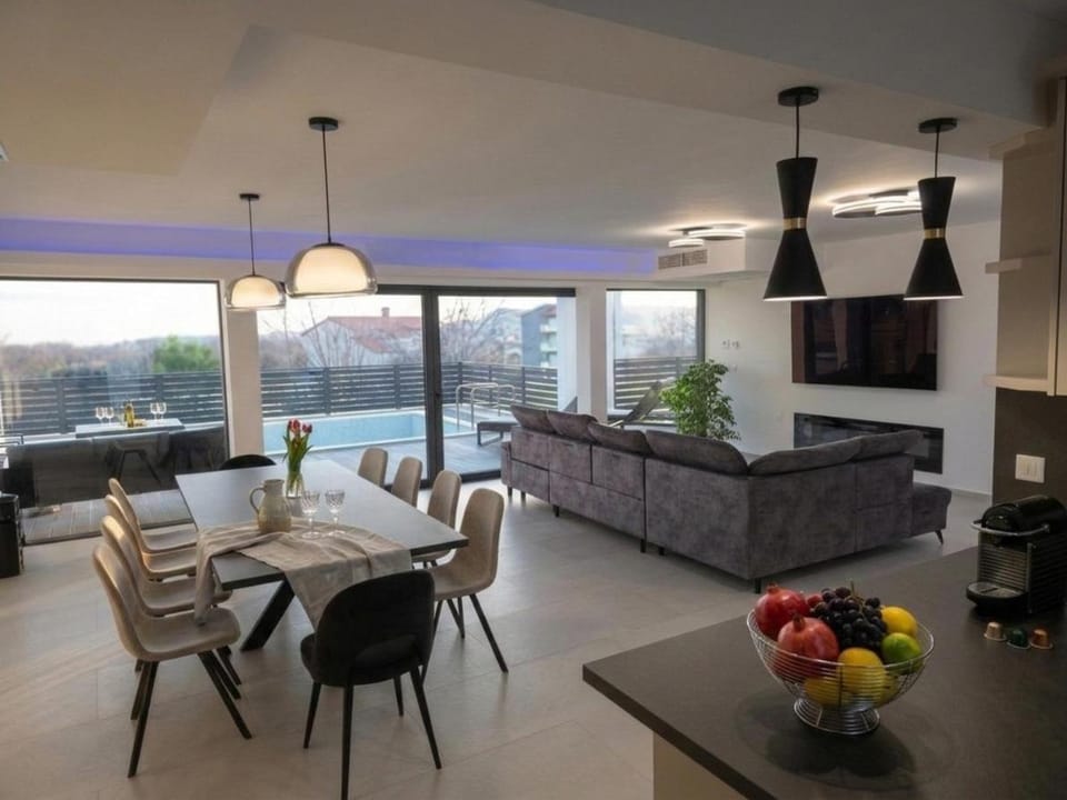 Patio, View (from property/room), Balcony/Terrace, Living room, Seating area, Dining area, Pool view, Swimming pool