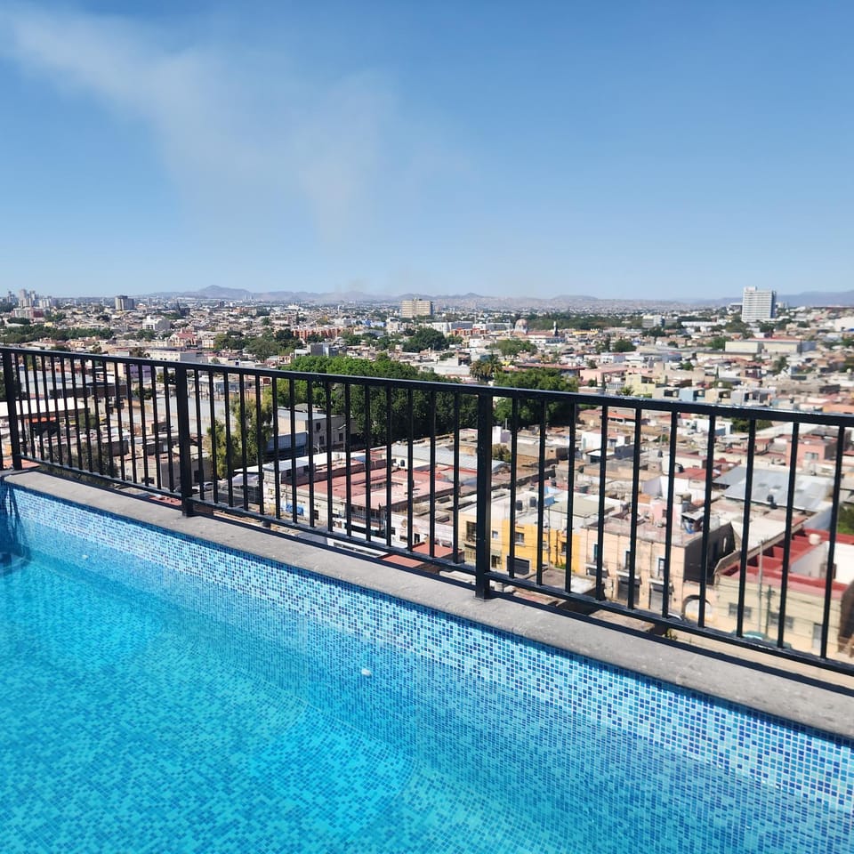 View (from property/room), City view, Pool view, Swimming pool