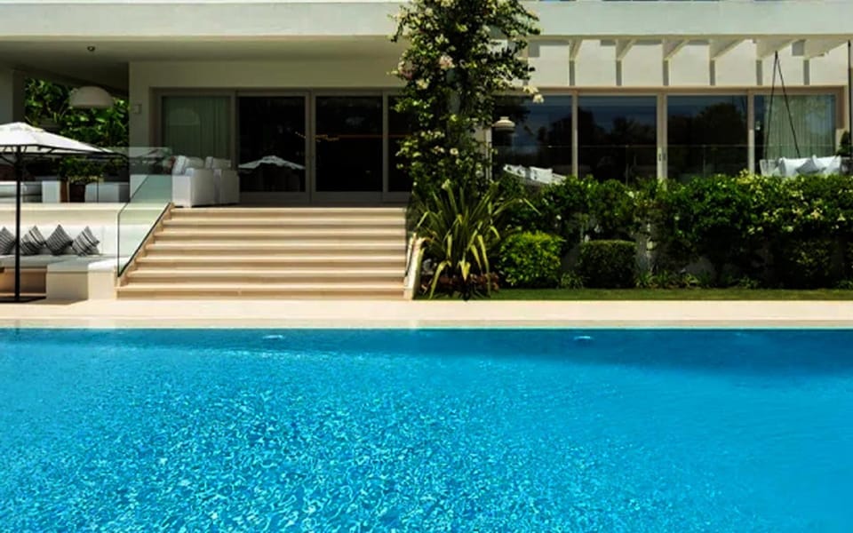 Property building, Day, Pool view, Swimming pool, sunbed