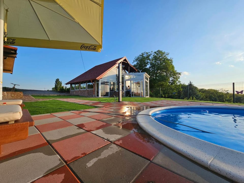 Property building, Patio, Garden, Swimming pool, sunbed