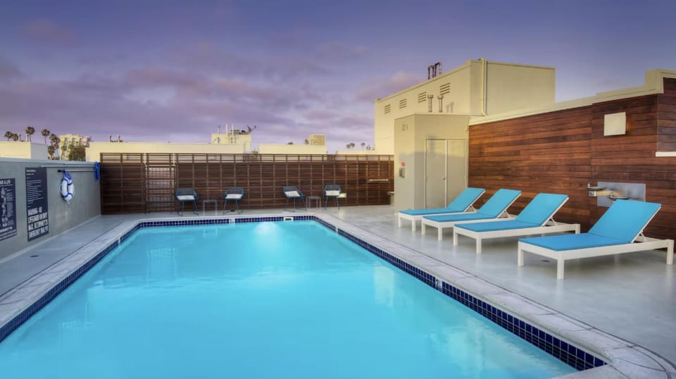 Property building, Swimming pool, Sunset, sunbed