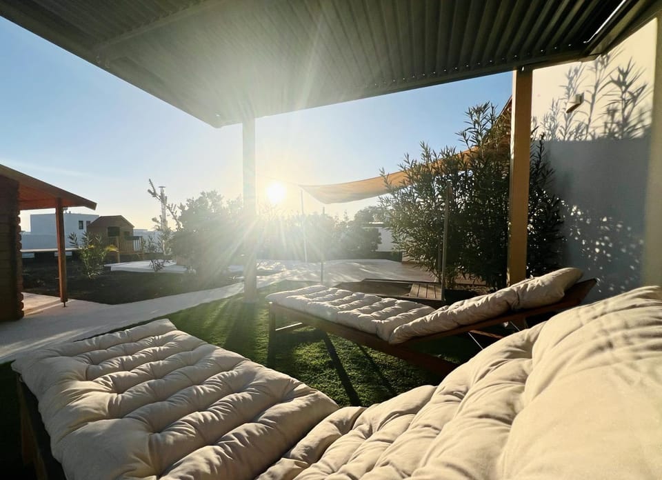 Natural landscape, View (from property/room), Balcony/Terrace, Seating area, Sunset, sunbed