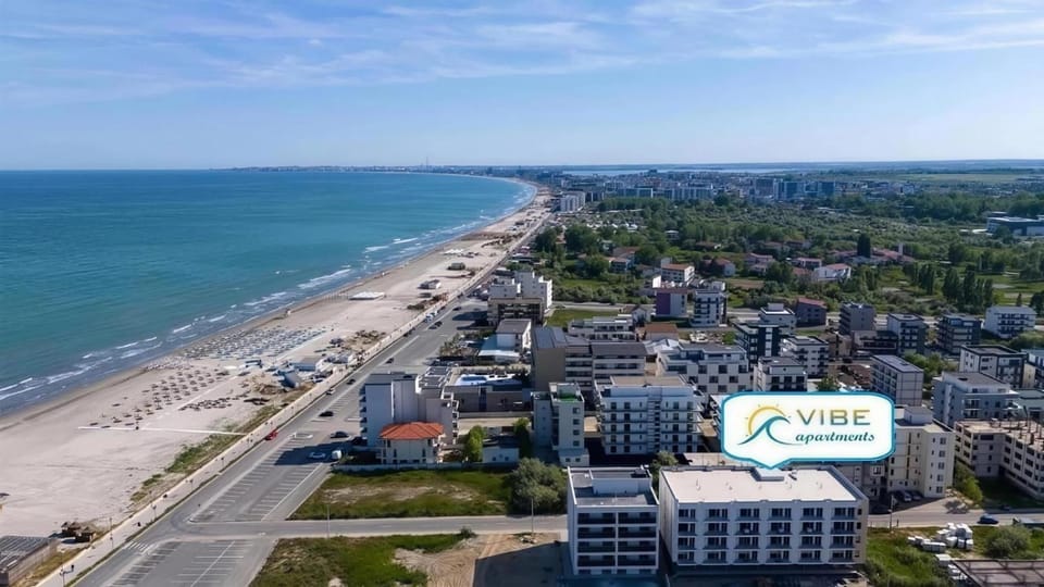 Property building, Nearby landmark, Natural landscape, Bird's eye view, Beach, Evening entertainment, City view, Street view, Location