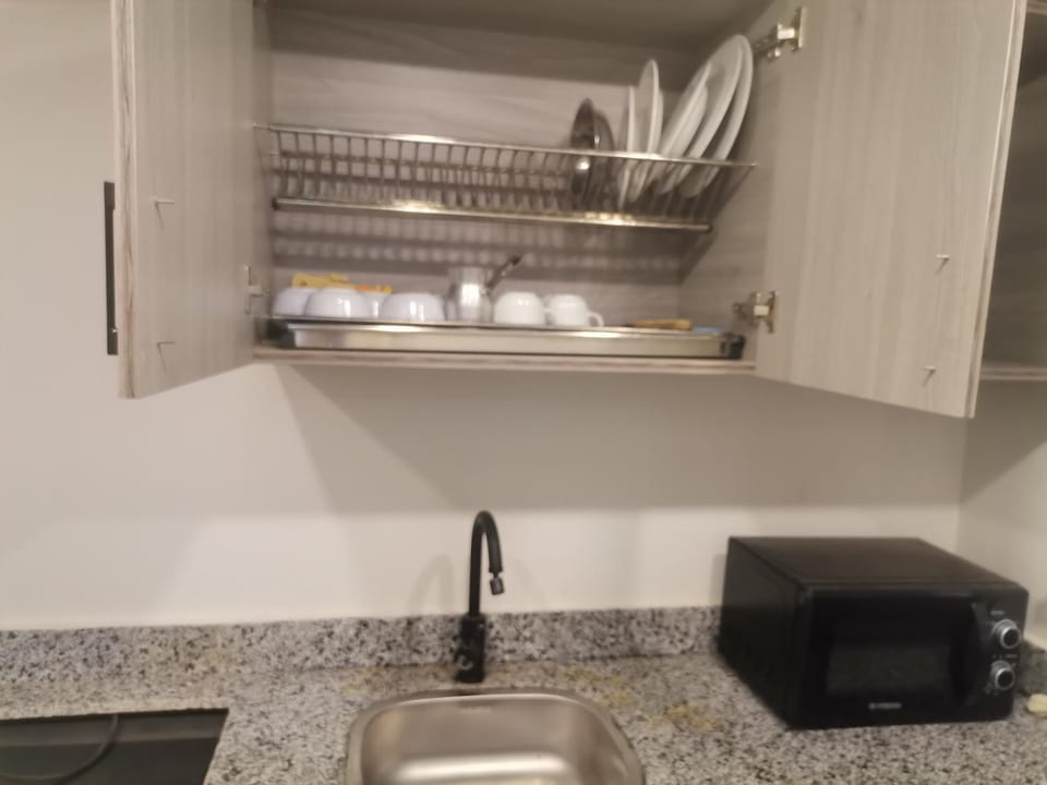 Kitchen or kitchenette, stove