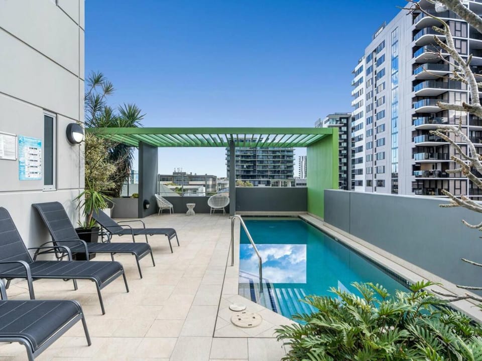 Property building, View (from property/room), Pool view, Swimming pool, sunbed
