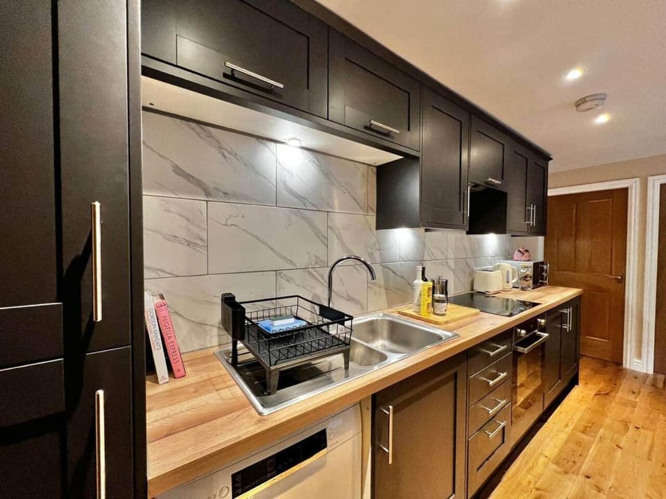Kitchen or kitchenette, oven, stove, toaster