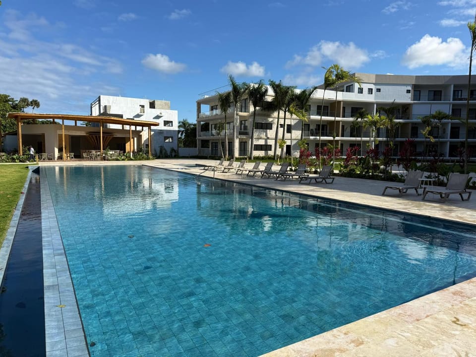 Property building, Pool view, Swimming pool, sunbed