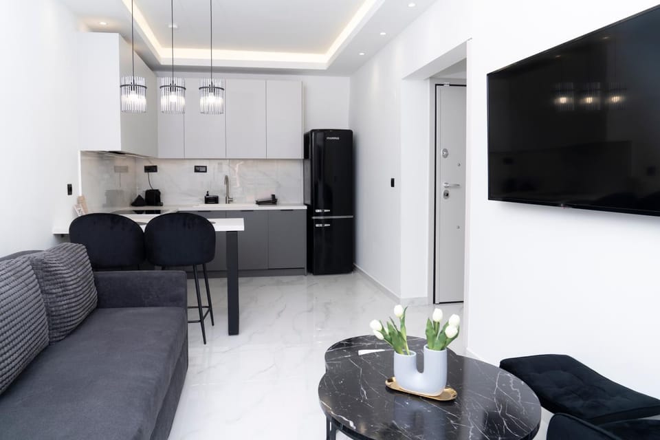 Coffee/tea facilities, Living room, Seating area, dishwasher, heating, heating, kitchen, kitchen, air conditioner, air conditioner