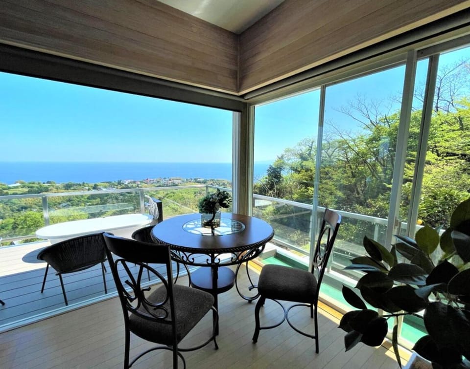 Patio, Day, View (from property/room), Living room, Dining area, Sea view