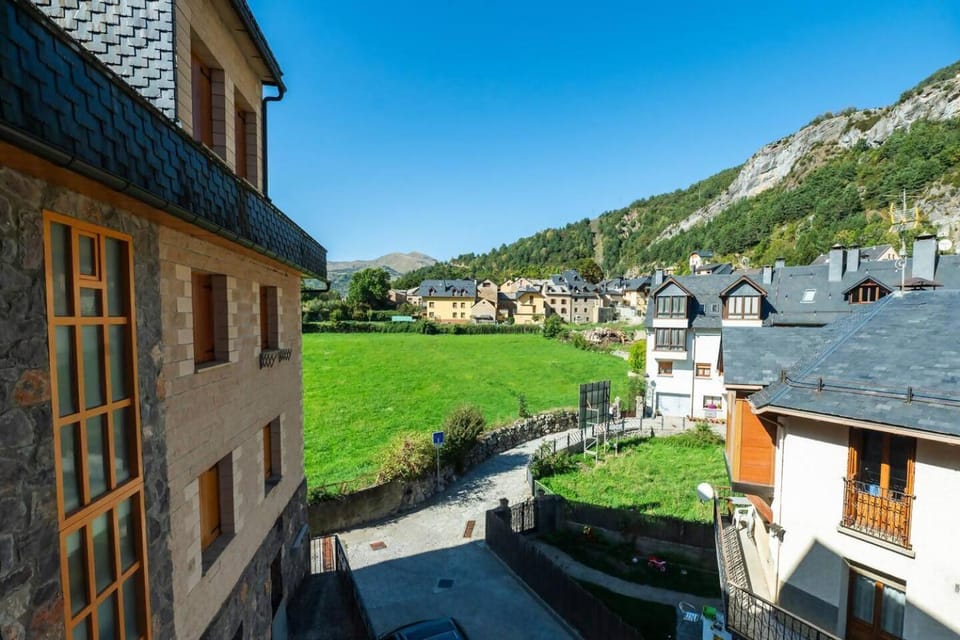 Property building, Nearby landmark, Spring, Day, Natural landscape, Mountain view, Street view
